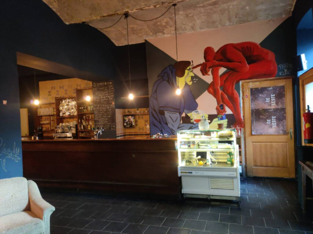 Photo of the bar at Celeste Vienna, some strange murals on the wall in the back: two human-like figures, persons? One looks as if it was sitting on the door at the back of the room. The sitting figure is red and puts their finger in the eye of the other, more realistic one.<br />” title=”Photo of the bar at Celeste Vienna, some strange murals on the wall in the back: two human-like figures, persons? One looks as if it was sitting on the door at the back of the room. The sitting figure is red and puts their finger in the eye of the other, more realistic one.<br />” loading=”eager” /></a></p>
<p><strong>Monday Improvisers Session</strong><br />Coming Monday October 13 @ Celeste<br />doors: 19:00<br />concert: 20:00<br />Hamburgerstraße 18, 1050 Wien</p>
<p>Sophie Hassfurther – sax<br />Dieb13 – record player</p>
<p>Facebook Link:<br /><a href=